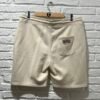 Dos du short beige Saint Viateur avec poche passepoilée